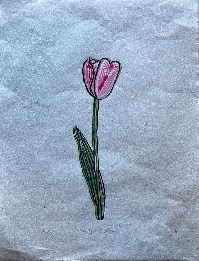 A 2-toned pink tulip with green and black colouring and outline it is printed on slightly crinkled white paper.